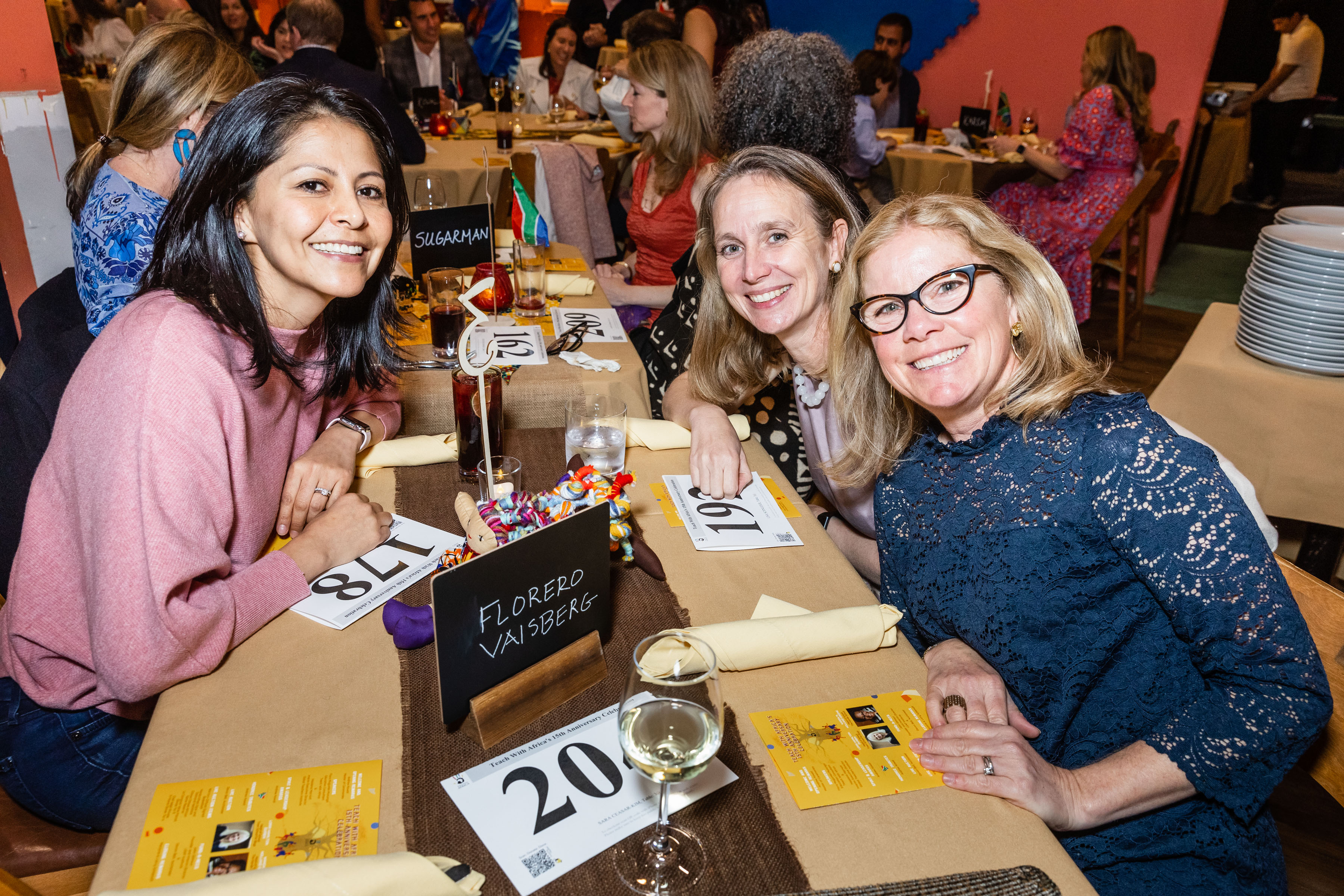 SAN FRANCISCO, CA - March 30 - Marilyn Cornedo, Mary Cesar Camp and Lisa Schneider attend Teach With Africa 15th Anniversary Celebrations on March 30th 2023 at Bissap Baobab SF @ 2243 Mission St, SF, CA 94110 US in San Francisco, CA (Photo - Ando Caulfield for Drew Altizer Photography)